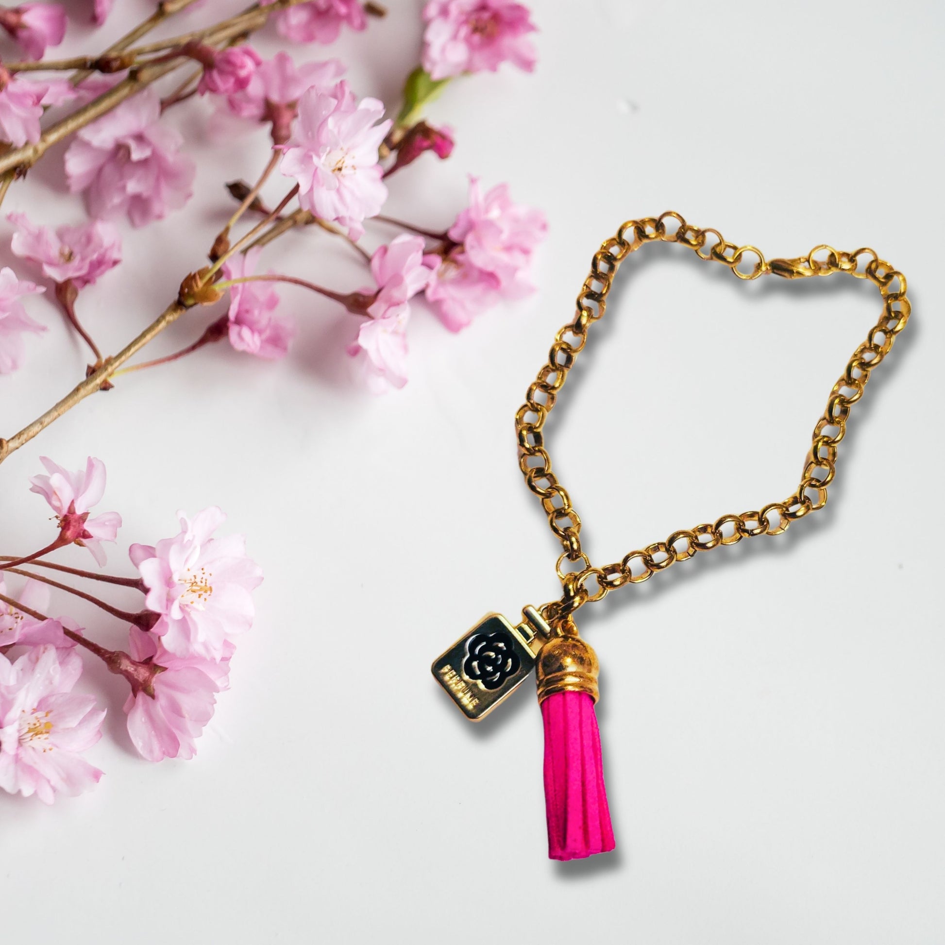 Pink Perfume Charm Bracelet